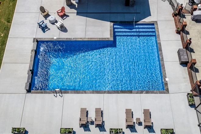 An aerial view of a swimming pool.