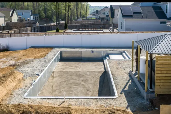a vinyl liner pool being installed.