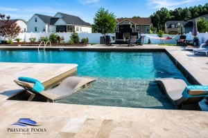 swimming-pool-tanning-ledge-with-loungers